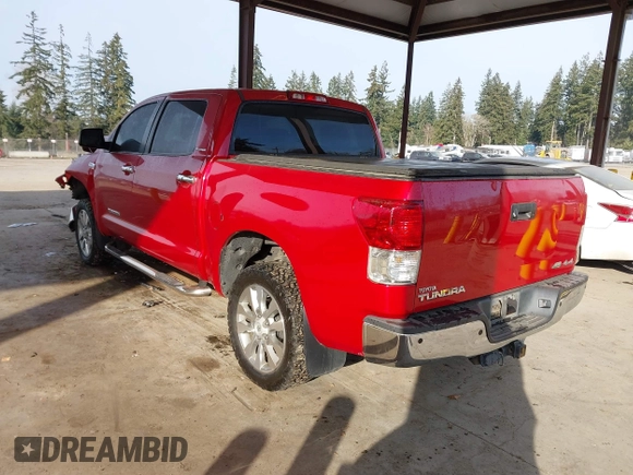 2012 Toyota Tundra 4WD Truck LTD with VIN 5TFHW5F13CX268552, listed as a IAAI auction lot 41461707 with 199,502 mi miles. Bid and sale history available at carsss.com. Image 3.