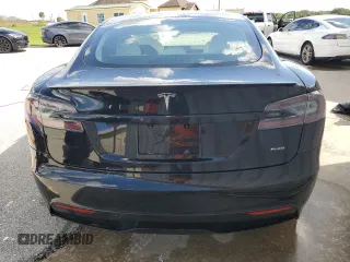 2022 Tesla Model S Plaid z VIN 5YJSA1E64NF461218, wystawiony jako Copart lot #74178794 z przebiegiem Nie podano mil oraz Szkoda całkowita • Salvage title. Historia ofert i sprzedaży dostępna na DreamBid. Obrazek 6.