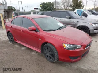 2015 Mitsubishi Lancer ES with VIN JA32U2FU6FU025259, listed as a IAAI auction lot 41345564 with 184,953 mi miles. Bid and sale history available at carsss.com. Image 1.