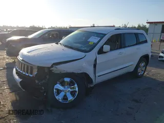 2011 Jeep Grand Cherokee Laredo with VIN 1J4RS4GGXBC739433, listed as a IAAI auction lot 41794031 with 174,672 mi miles and . Bid and sale history available at DreamBid. Image 18.