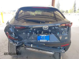 2024 Mazda CX-30 S Preferred with VIN 3MVDMBCM0RM641917, listed as a IAAI auction lot 42058344 with 3,005 mi miles and . Bid and sale history available at DreamBid. Image 6.