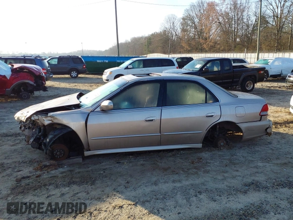 2002 Honda Accord EX z VIN 1HGCG16522A065397, wystawiony jako IAAI lot #41790485 z przebiegiem 223 389 mil mil oraz . Historia ofert i sprzedaży dostępna na DreamBid. Obrazek 14.