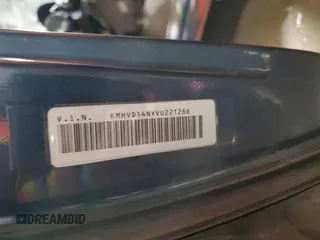 1997 Hyundai Accent z VIN KMHVD14NXVU221266, wystawiony jako Copart lot #86383044 z przebiegiem 159 517 mil mil oraz Szkody całkowita. Historia ofert i sprzedaży dostępna na DreamBid. Obrazek 12.