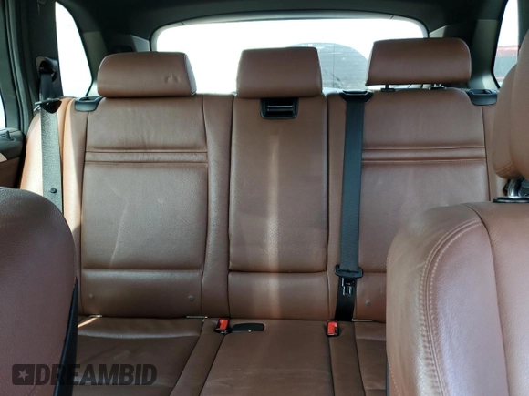 2012 BMW X5 50i with VIN 5UXZV8C59CL424356, listed as a Copart auction lot 54763725 with 107,712 mi miles and Salvage title. Bid and sale history available at DreamBid. Image 10.