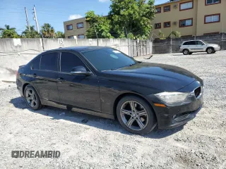 2014 BMW 3 Series 328i with VIN WBA3A5C52EJ464789, listed as a Copart auction lot 56327945 with 153,006 mi miles and Salvage title. Bid and sale history available at DreamBid. Image 4.
