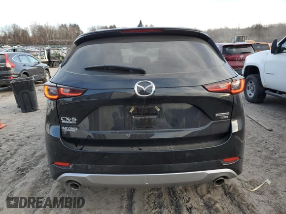 2024 Mazda CX-5 2.5 Turbo Signature with VIN JM3KFBXY7R0515256, listed as a Copart auction lot 87404694 with 4,699 mi miles and Salvage Title. Bid and sale history available at carsss.com. Image 6.