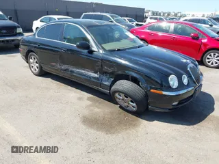 2003 Jaguar S-Type with VIN SAJEA01T13FM70486, listed as a IAAI auction lot 41989501 with 100,109 mi miles and . Bid and sale history available at DreamBid. Image 1.