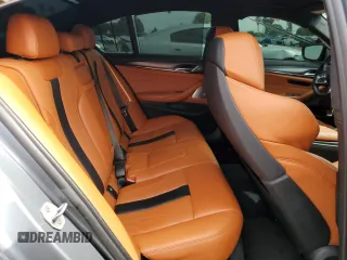 2018 BMW M5 z VIN WBSJF0C50JB282083, wystawiony jako Copart lot #55845673 z przebiegiem 39 691 mil mil oraz . Historia ofert i sprzedaży dostępna na DreamBid. Obrazek 10.