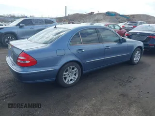 2003 Mercedes-Benz E-Class 3.2L with VIN WDBUF65J43A232053, listed as a IAAI auction lot 41930685 with 74,675 mi miles. Bid and sale history available at carsss.com. Image 4.
