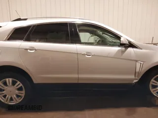2016 Cadillac SRX Luxury Collection with VIN 3GYFNEE3XGS566210, listed as a IAAI auction lot 42094984 with 99,671 mi miles and . Bid and sale history available at DreamBid. Image 13.