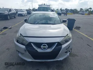 2016 Nissan Maxima SL with VIN 1N4AA6AP0GC433932, listed as a IAAI auction lot 41897180 with 91,871 mi miles and . Bid and sale history available at DreamBid. Image 13.