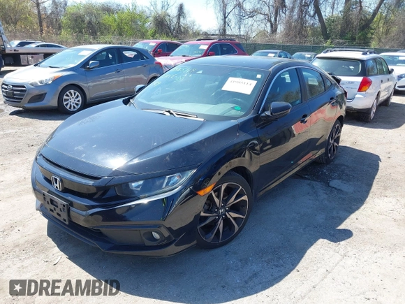 2019 Honda Civic Sport with VIN 2HGFC2F89KH569861, listed as a IAAI auction lot 41985114 with 104,880 mi miles and . Bid and sale history available at DreamBid. Image 18.