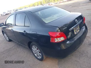 2009 Toyota Yaris with VIN JTDBT903894044347, listed as a IAAI auction lot 42069061 with 197,348 mi miles. Bid and sale history available at carsss.com. Image 3.