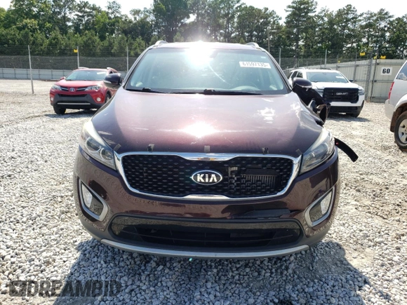 2016 Kia Sorento EX z VIN 5XYPH4A16GG032817, wystawiony jako Copart lot #61597135 z przebiegiem 90 911 mil mil oraz Szkoda całkowita • Salvage title. Historia ofert i sprzedaży dostępna na DreamBid. Obrazek 5.