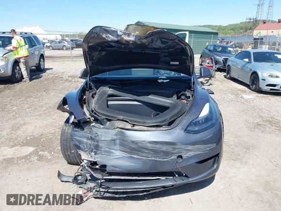2023 Tesla Model Y Long Range z VIN 7SAYGDEE8PA191415, wystawiony jako IAAI lot #42155577 z przebiegiem 42 149 mil mil oraz . Historia ofert i sprzedaży dostępna na DreamBid. Obrazek 13.