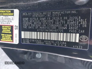 2021 Toyota Camry SE Nightshade with VIN 4T1G11AK5MU487725, listed as a IAAI auction lot 41196499 with 104,715 mi miles and . Bid and sale history available at DreamBid. Image 9.