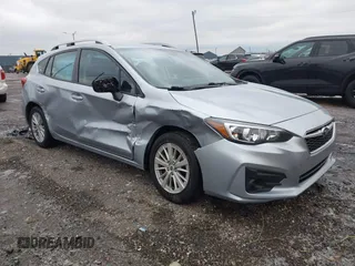 2018 Subaru Impreza Premium with VIN 4S3GTAB61J3734031, listed as a IAAI auction lot 41530869 with 89,154 mi miles. Bid and sale history available at carsss.com. Image 1.