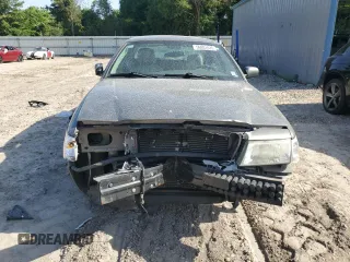 2004 Mercury Grand Marquis LS Premium z VIN 2MEFM75W34X688862, wystawiony jako Copart lot #56801635 z przebiegiem 150 371 mil mil oraz Szkody całkowita. Historia ofert i sprzedaży dostępna na DreamBid. Obrazek 5.