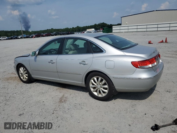 2006 Hyundai Azera SE with VIN KMHFC46F66A133655, listed as a Copart auction lot 62291215 with 122,998 mi miles and Salvage title. Bid and sale history available at DreamBid. Image 2.