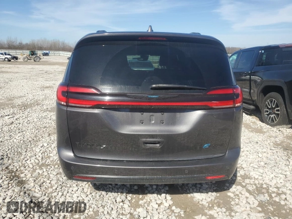 2021 Chrysler Pacifica Hybrid Touring L with VIN 2C4RC1L76MR526898, listed as a Copart auction lot 48133815 with 73,274 mi miles and Salvage title. Bid and sale history available at DreamBid. Image 6.