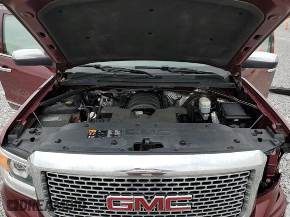2014 GMC Sierra 1500 Denali z VIN 3GTU2WEC7EG322946, wystawiony jako Copart lot #56100915 z przebiegiem 60 792 mil mil oraz Szkoda całkowita • Salvage title. Historia ofert i sprzedaży dostępna na DreamBid. Obrazek 11.