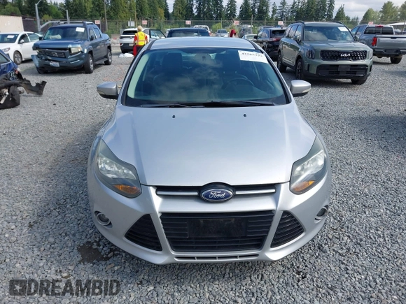 2014 Ford Focus Titanium with VIN 1FADP3N20EL160982, listed as a IAAI auction lot 42565322 with 112,551 mi miles and . Bid and sale history available at DreamBid. Image 12.