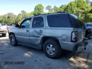 2000 Chevrolet Tahoe LS with VIN 1GNEK13T2YJ203710, listed as a Copart auction lot 57302495 with 237,227 mi miles and Salvage title. Bid and sale history available at DreamBid. Image 2.