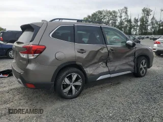 2021 Subaru Forester Touring z VIN JF2SKAXC0MH560263, wystawiony jako Copart lot #61453195 z przebiegiem Nie podano mil oraz Szkoda całkowita • Salvage title. Historia ofert i sprzedaży dostępna na DreamBid. Obrazek 3.