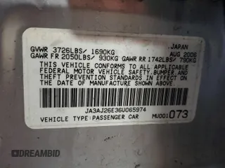 2006 Mitsubishi Lancer ES with VIN JA3AJ26E36U065974, listed as a Copart auction lot 52081885 with 201,728 mi miles and Salvage Title. Bid and sale history available at carsss.com. Image 12.