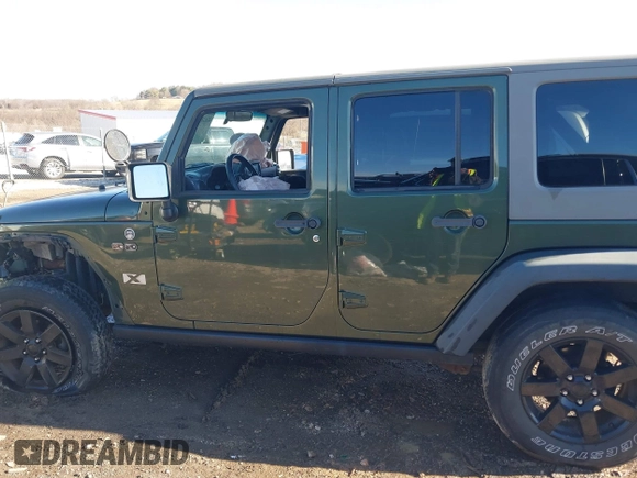 2008 Jeep Wrangler Unlimited X with VIN 1J8GA39118L594626, listed as a IAAI auction lot 41618878 with 166,071 mi miles and . Bid and sale history available at DreamBid. Image 14.