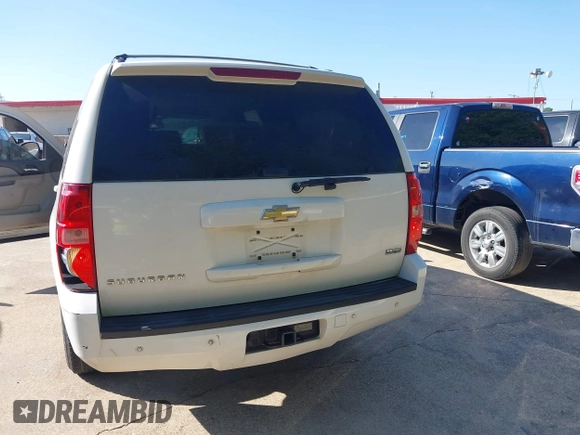2011 Chevrolet Suburban LT with VIN 1GNSCJE06BR309881, listed as a IAAI auction lot 42577452 with 254,073 mi miles and . Bid and sale history available at DreamBid. Image 16.