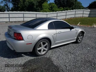 2000 Ford Mustang GT z VIN 1FAFP42X8YF309852, wystawiony jako Copart lot #57959605 z przebiegiem 251 001 mil mil oraz Szkoda całkowita • Salvage title. Historia ofert i sprzedaży dostępna na DreamBid. Obrazek 3.