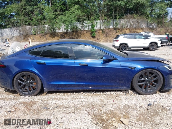 2022 Tesla Model S with VIN 5YJSA1E55NF486443, listed as a IAAI auction lot 42720110 with Not provided miles and . Bid and sale history available at DreamBid. Image 14.