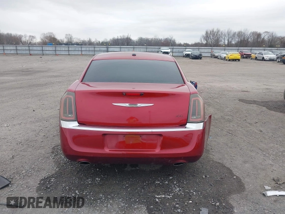 2012 Chrysler 300 Limited z VIN 2C3CCACG7CH250858, wystawiony jako IAAI lot #41709739 z przebiegiem 236 991 mil mil oraz . Historia ofert i sprzedaży dostępna na DreamBid. Obrazek 16.