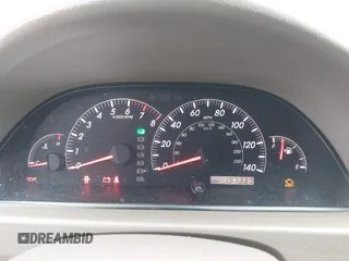 2005 Toyota Camry LE z VIN 4T1BE30K25U063254, wystawiony jako IAAI lot #41871499 z przebiegiem 197 337 mil mil oraz . Historia ofert i sprzedaży dostępna na DreamBid. Obrazek 7.
