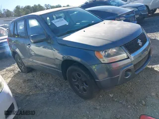 2007 Suzuki Grand Vitara with VIN JS3TE941974200708, listed as a IAAI auction lot 41589258 with 207,472 mi miles. Bid and sale history available at carsss.com. Image 1.