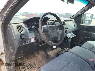 2014 Ford F-150 XL with VIN 1FTFX1EF5EKE74319, listed as a IAAI auction lot 42260527 with 268,199 mi miles and . Bid and sale history available at DreamBid. Image 1.