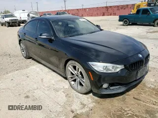 2015 BMW 4 Series 428i z VIN WBA4A9C57FD416121, wystawiony jako Copart lot #53475555 z przebiegiem 186 572 mil mil oraz Szkoda całkowita • Salvage title. Historia ofert i sprzedaży dostępna na DreamBid. Obrazek 11.