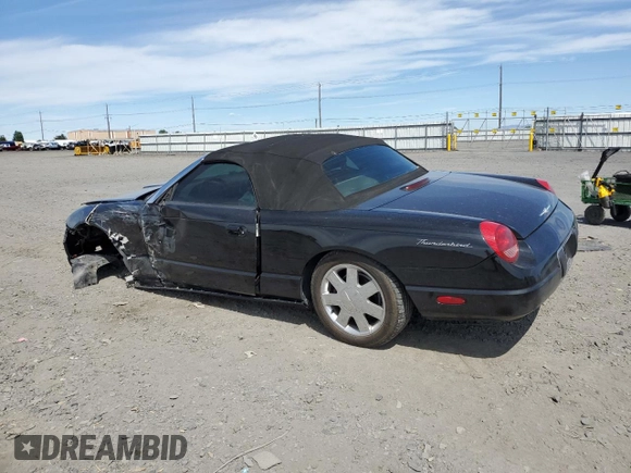 2002 Ford Thunderbird Hardtop Premium z VIN 1FAHP60A92Y117614, wystawiony jako Copart lot #59344735 z przebiegiem 83 723 mil mil oraz Szkoda całkowita • Salvage title. Historia ofert i sprzedaży dostępna na DreamBid. Obrazek 2.