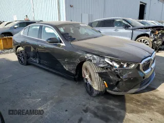 2024 BMW i5 eDrive40 with VIN WBY33FK06RCR89436, listed as a Copart auction lot 76718924 with 0 mi miles and Salvage Title. Bid and sale history available at carsss.com. Image 4.