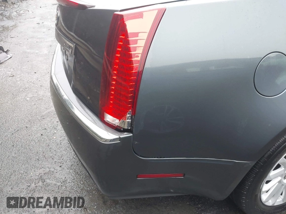 2012 Cadillac CTS with VIN 1G6DA5E56C0143588, listed as a IAAI auction lot 41416131 with 230,310 mi miles and . Bid and sale history available at DreamBid. Image 6.