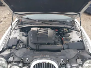 2002 Jaguar S-Type with VIN SAJDA01P12GM35163, listed as a IAAI auction lot 41097415 with 114,017 mi miles and . Bid and sale history available at DreamBid. Image 10.