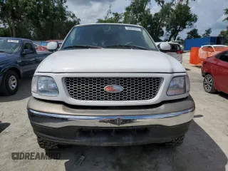 2003 Ford F-150 XL with VIN 1FTRX07W13KC28871, listed as a Copart auction lot 59003245 with 180,197 mi miles and Salvage title. Bid and sale history available at DreamBid. Image 5.