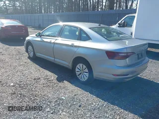 2019 Volkswagen Jetta S z VIN 3VWC57BUXKM242671, wystawiony jako IAAI lot #41813164 z przebiegiem 100 642 mil mil oraz . Historia ofert i sprzedaży dostępna na DreamBid. Obrazek 3.