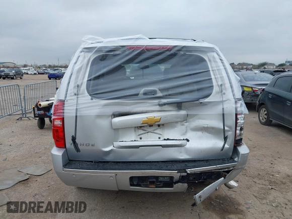 2014 Chevrolet Tahoe LTZ z VIN 1GNSCCE04ER159110, wystawiony jako IAAI lot #41615653 z przebiegiem 171 422 mil mil oraz . Historia ofert i sprzedaży dostępna na DreamBid. Obrazek 16.