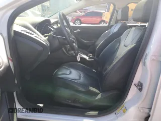 2015 Ford Focus Titanium with VIN 1FADP3J23FL300126, listed as a Copart auction lot 54434165 with 176,526 mi miles and Salvage title. Bid and sale history available at DreamBid. Image 7.