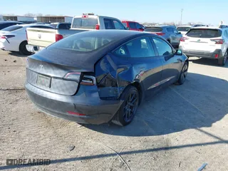 2023 Tesla Model 3 with VIN 5YJ3E1EA3PF678825, listed as a IAAI auction lot 41283153 with 8,607 mi miles. Bid and sale history available at carsss.com. Image 4.