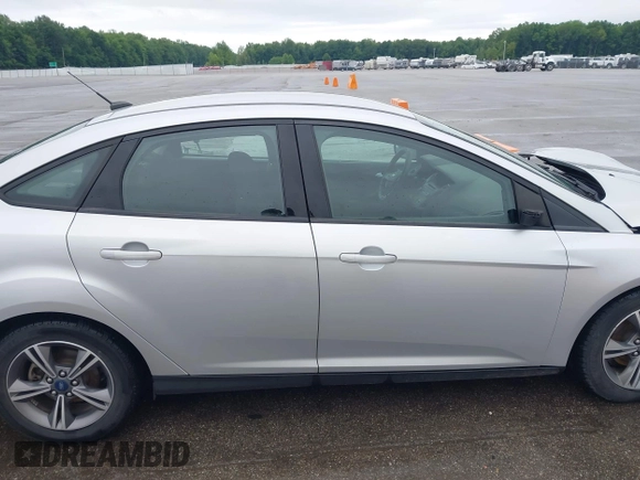 2017 Ford Focus SE with VIN 1FADP3FEXHL283329, listed as a IAAI auction lot 42347751 with 85,337 mi miles and . Bid and sale history available at DreamBid. Image 14.