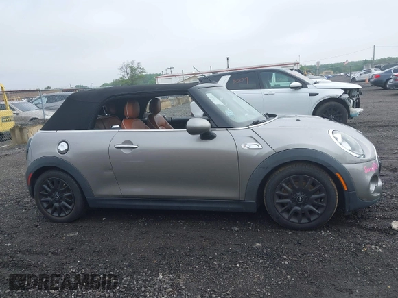 2016 MINI Convertible S z VIN WMWWG9C53G3A91095, wystawiony jako IAAI lot #42283353 z przebiegiem Nie podano mil oraz . Historia ofert i sprzedaży dostępna na DreamBid. Obrazek 13.