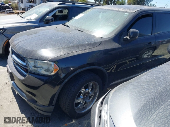 2013 Dodge Durango SXT with VIN 1C4RDHAG2DC673236, listed as a IAAI auction lot 42506024 with 198,215 mi miles and . Bid and sale history available at DreamBid. Image 2.